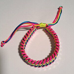 pink yellow blue and silver tone metal bracelet